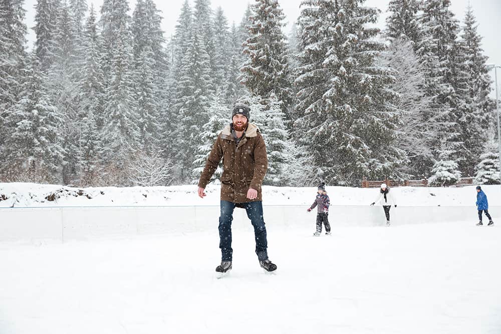 Man ice skating outdoors